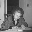 women reading braille